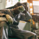 Exhausted industrial worker resting his head, illustrating workplace fatigue