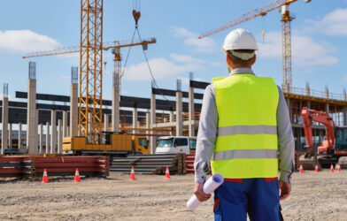 Construction site inspector reviewing a build in progress
