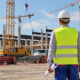 Construction site inspector reviewing a build in progress