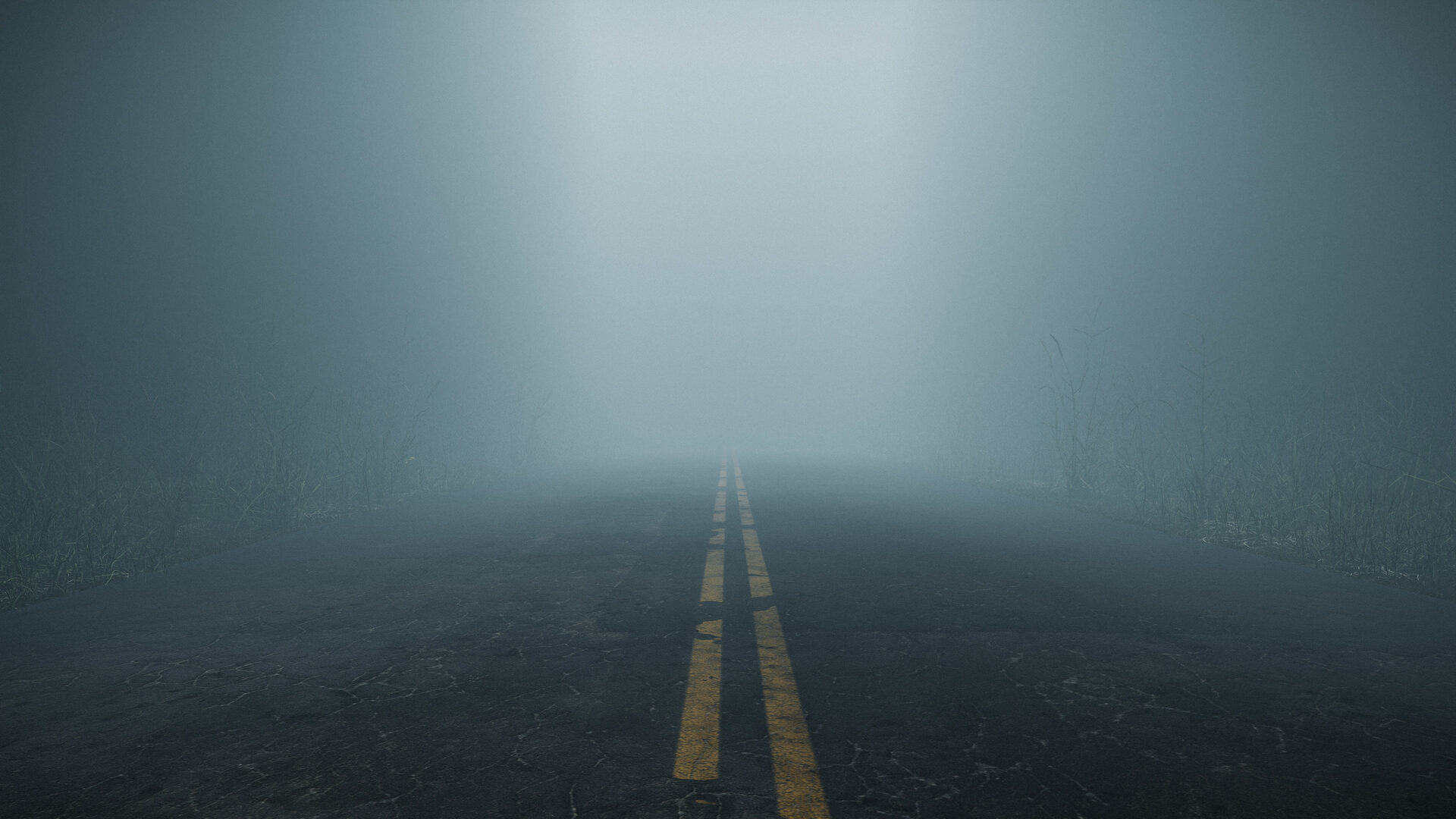 Misty, foggy road representing uncertainty and unpredictability