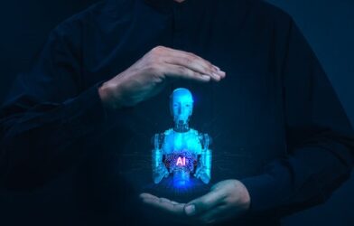 Human hands protecting AI robot hologram - responsible artificial intelligence