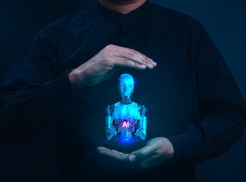 Human hands protecting AI robot hologram - responsible artificial intelligence