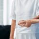 Healthcare worker providing assistance to elderly patient in care facility