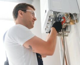 Professional technician checking natural gas boiler - qualified boiler service