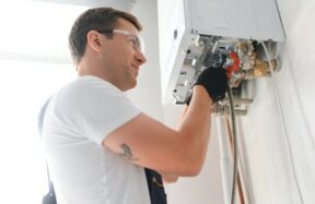 Professional technician checking natural gas boiler - qualified boiler service