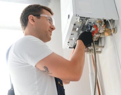 Professional technician checking natural gas boiler - qualified boiler service