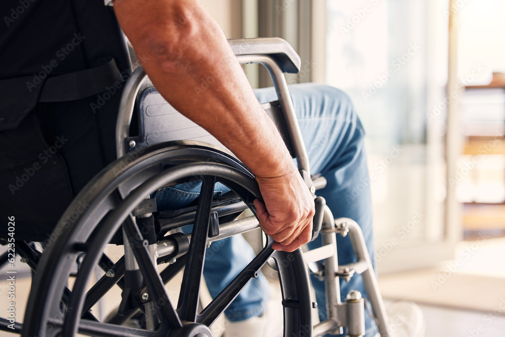 Worker in wheelchair representing workplace injury recovery and safety programs